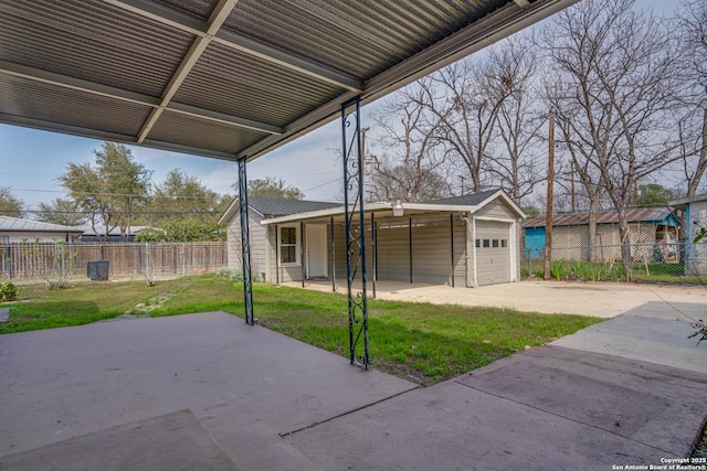 2411 W Huisache Ave, San Antonio, TX 78228 - view of patio featuring a detached garage