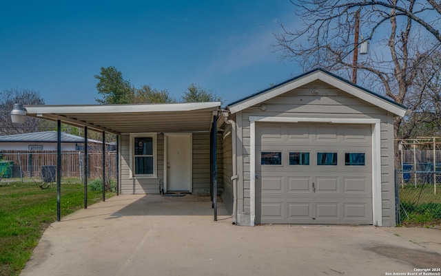 2411 W Huisache Ave, San Antonio, TX 78228 - view of front facade with a garage and driveway