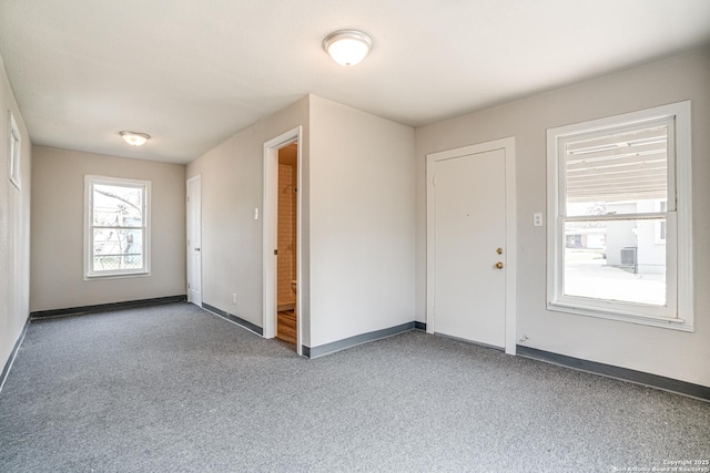 2411 W Huisache Ave, San Antonio, TX 78228 - carpeted empty room with baseboards