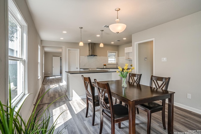 2411 W Huisache Ave, San Antonio, TX 78228 - dining room featuring dark wood-style floors, baseboards, and recessed lighting