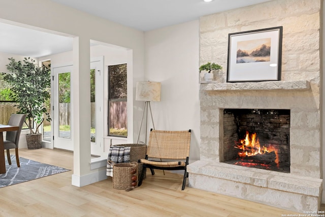 500 Skyforest, Hollywood Park, TX 78232 - sitting room featuring a fireplace and wood finished floors