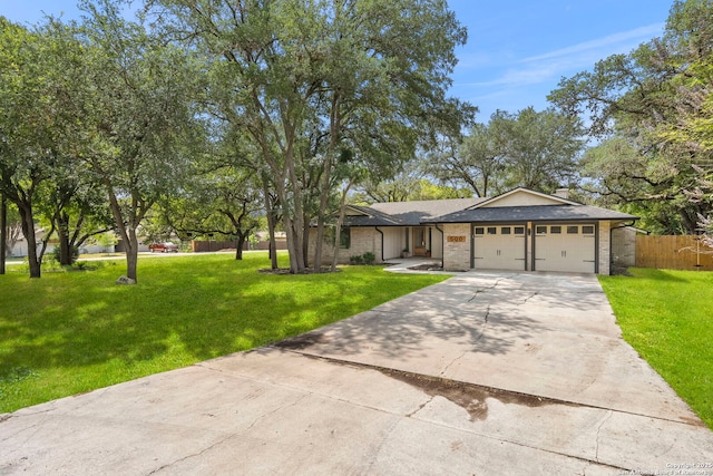 500 Skyforest, Hollywood Park, TX 78232 - view of front facade with a garage, concrete driveway, brick siding, and a shingled roof