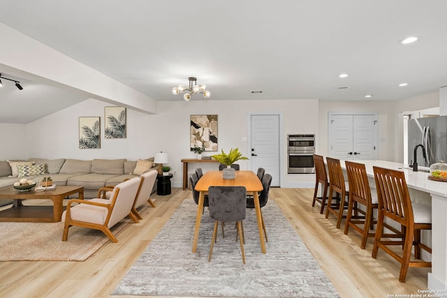 500 Skyforest, Hollywood Park, TX 78232 - dining space featuring light wood-style floors, a chandelier, and recessed lighting