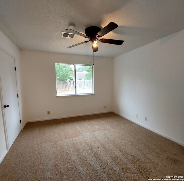 3730 Candlestone, San Antonio, TX 78244 - carpeted spare room featuring ceiling fan, baseboards, and a textured ceiling