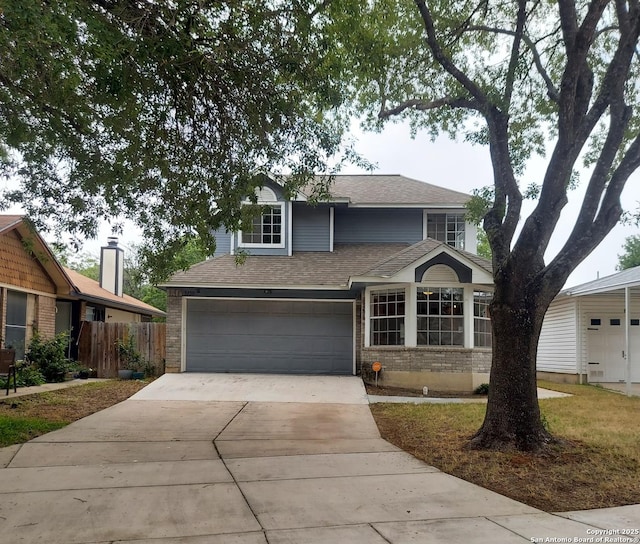 3730 Candlestone, San Antonio, TX 78244 - traditional home featuring driveway, brick siding, a shingled roof, and an attached garage
