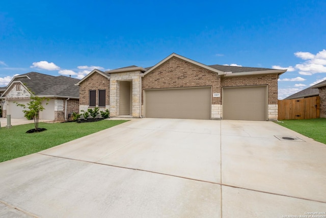 5957 Cerulean, Bulverde, TX 78163 - view of front of home featuring driveway, a garage, brick siding, and roof with shingles