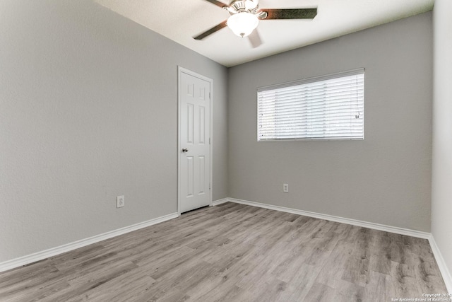 16311 Kentucky Rdg, Selma, TX 78154 - spare room featuring light wood-style floors, a ceiling fan, and baseboards