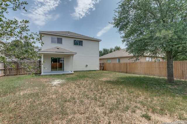 16311 Kentucky Rdg, Selma, TX 78154 - back of property with a patio area and a shingled roof