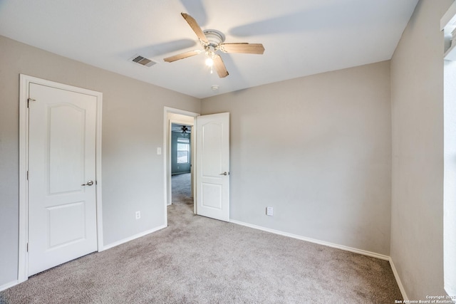 9843 Barhill Bay, San Antonio, TX 78245 - unfurnished bedroom with carpet floors, baseboards, and a ceiling fan