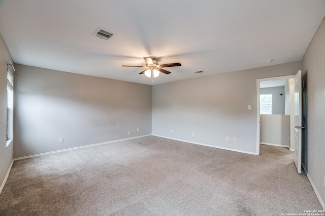 9843 Barhill Bay, San Antonio, TX 78245 - carpeted empty room with ceiling fan and baseboards