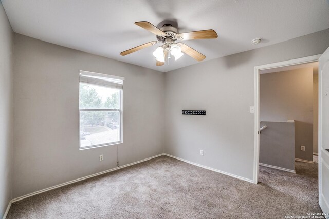 9843 Barhill Bay, San Antonio, TX 78245 - carpeted spare room featuring a ceiling fan, a smoke detector, and baseboards