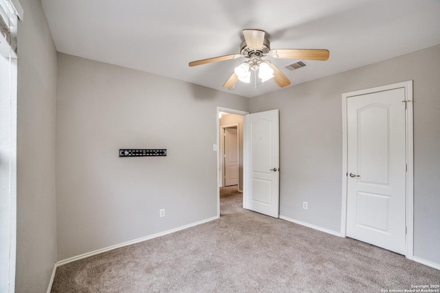 9843 Barhill Bay, San Antonio, TX 78245 - unfurnished bedroom with carpet flooring, baseboards, and a ceiling fan