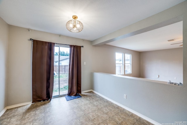 9843 Barhill Bay, San Antonio, TX 78245 - foyer entrance with a chandelier and baseboards