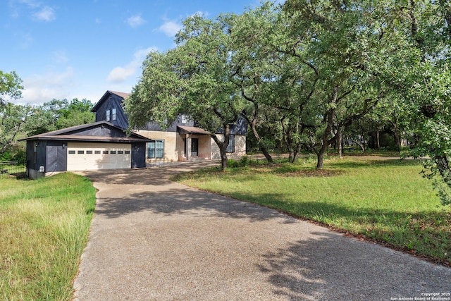 3719 Summer Breeze, San Antonio, TX 78253 - view of front of home featuring driveway, a front lawn, and a garage