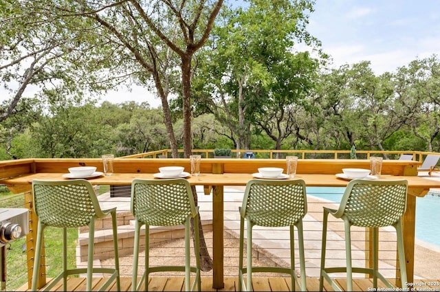 3719 Summer Breeze, San Antonio, TX 78253 - wooden deck featuring view of scattered trees and outdoor dining area