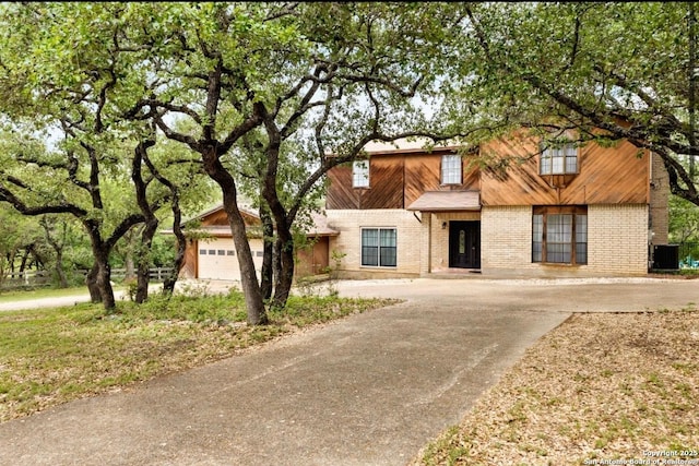 3719 Summer Breeze, San Antonio, TX 78253 - view of front of home featuring central AC unit, driveway, and brick siding