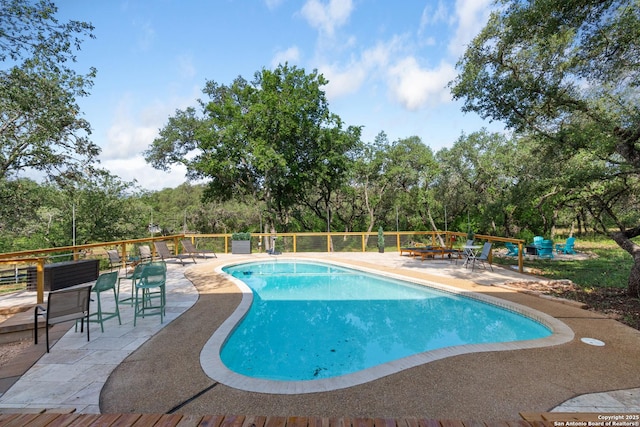 3719 Summer Breeze, San Antonio, TX 78253 - view of swimming pool featuring a patio area and view of wooded area