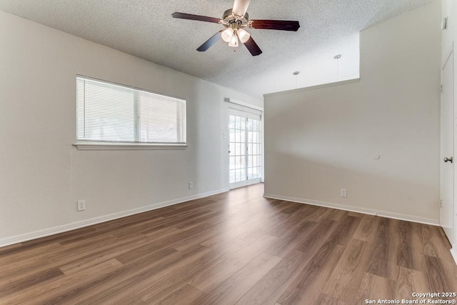 6419 Ridge Tree, San Antonio, TX 78233 - spare room featuring a textured ceiling, wood finished floors, ceiling fan, and baseboards