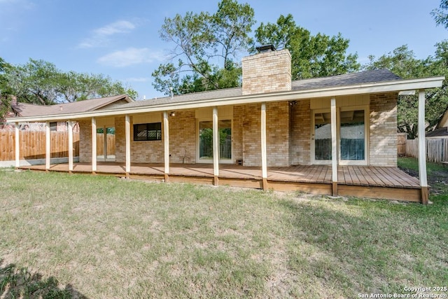 6419 Ridge Tree, San Antonio, TX 78233 - rear view of house with brick siding, a chimney, and a wooden deck