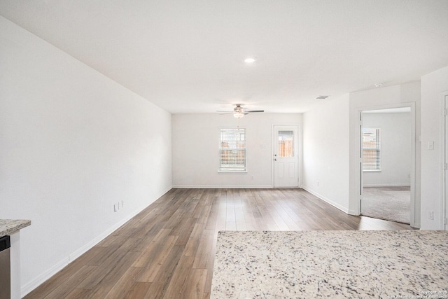 10939 Delight, Converse, TX 78109 - unfurnished living room with ceiling fan, wood finished floors, recessed lighting, and baseboards