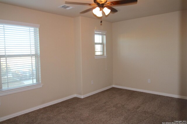 9118 Hogarten, Converse, TX 78109 - carpeted spare room featuring a ceiling fan and baseboards