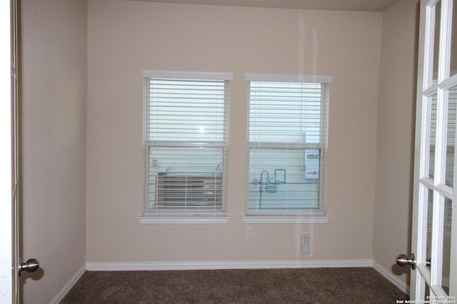 9118 Hogarten, Converse, TX 78109 - carpeted empty room with baseboards