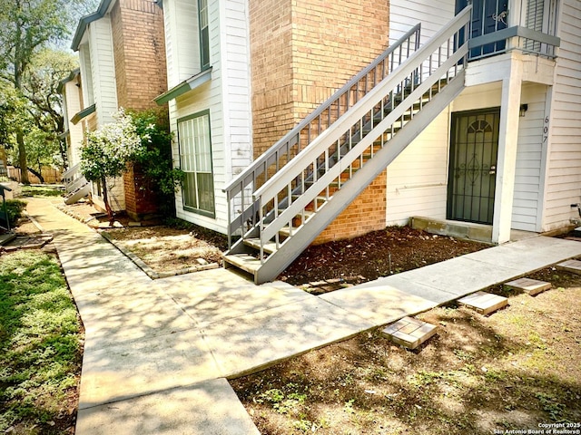 11311 Sir Winston Unit 607, San Antonio, TX 78216 - property entrance featuring brick siding