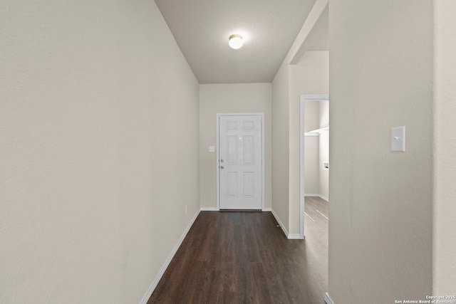 2429 Marty Way, Seguin, TX 78155 - hall featuring baseboards and dark wood-style flooring