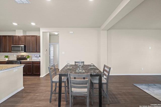 2429 Marty Way, Seguin, TX 78155 - dining area with baseboards, dark wood-type flooring, and recessed lighting