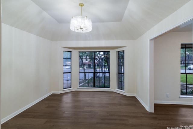 9215 Standing Crk, San Antonio, TX 78230 - unfurnished room with a chandelier, dark wood-style floors, and baseboards