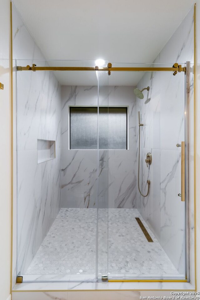 9215 Standing Crk, San Antonio, TX 78230 - full bath featuring a marble finish shower
