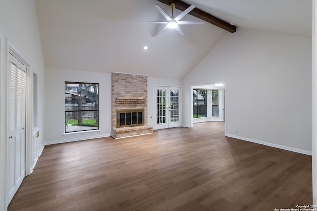 9215 Standing Crk, San Antonio, TX 78230 - unfurnished living room with high vaulted ceiling, ceiling fan, beam ceiling, a large fireplace, and baseboards