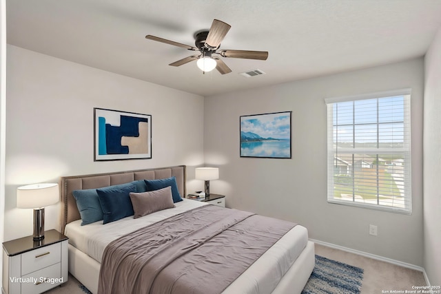31553 Acacia Vis, Bulverde, TX 78163 - carpeted bedroom featuring baseboards and ceiling fan