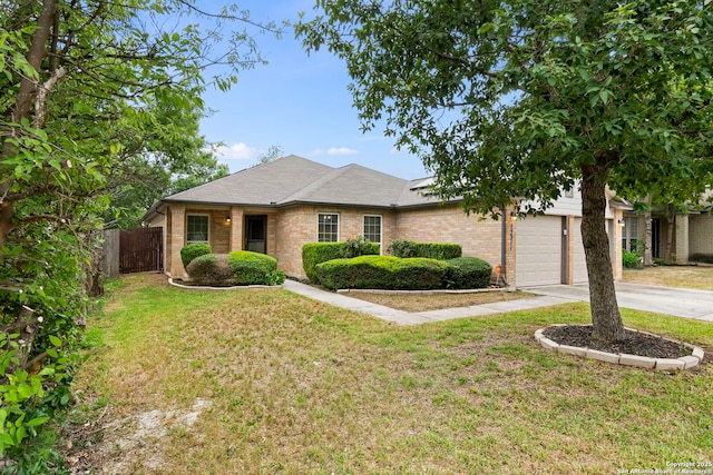 15311 Spring Rock, San Antonio, TX 78247 - single story home with concrete driveway and brick siding