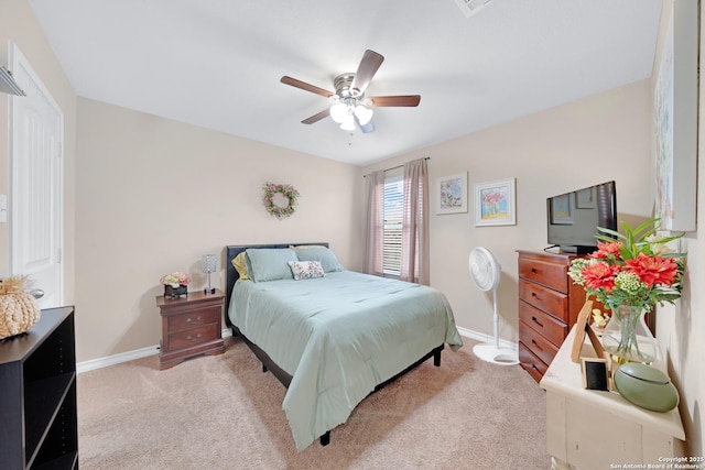 5903 Overture Dawn, San Antonio, TX 78252 - bedroom featuring baseboards, carpet floors, and a ceiling fan