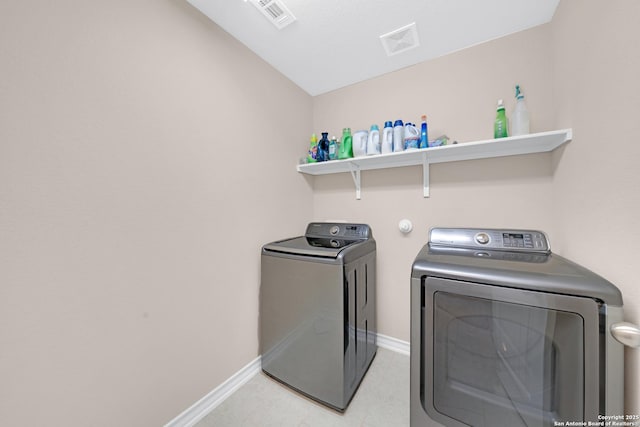 5903 Overture Dawn, San Antonio, TX 78252 - laundry area featuring washer and clothes dryer and baseboards