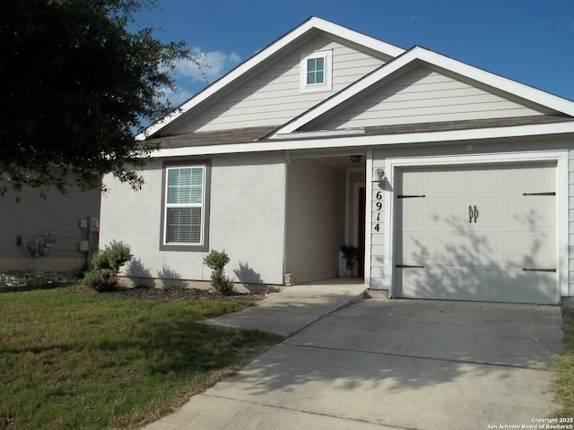 6914 Cozy, San Antonio, TX 78218 - single story home featuring concrete driveway, a garage, a front yard, and stucco siding