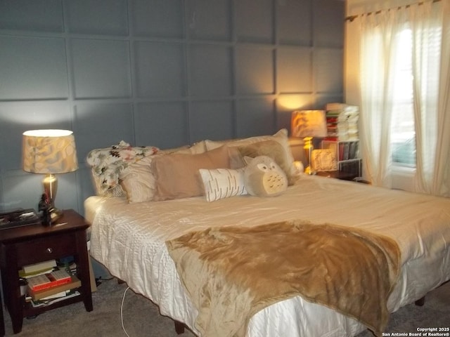 6914 Cozy, San Antonio, TX 78218 - bedroom with a decorative wall and carpet floors