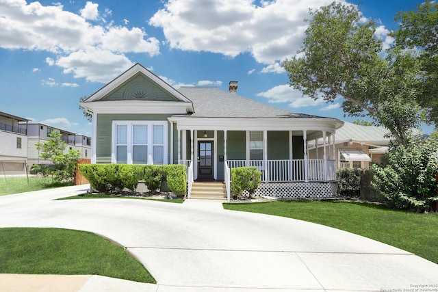1526 Saint Marys, San Antonio, TX 78210 - view of front of property featuring covered porch, a front yard, and a chimney