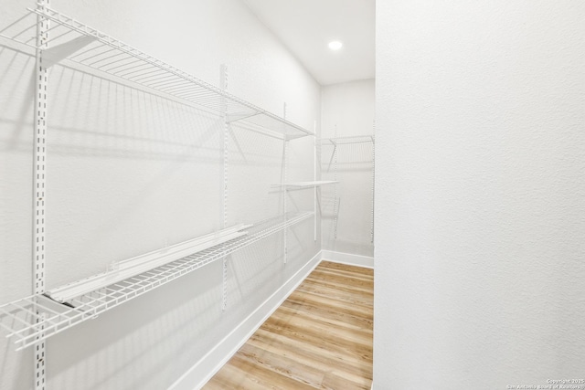 1526 Saint Marys, San Antonio, TX 78210 - walk in closet featuring light wood-style floors