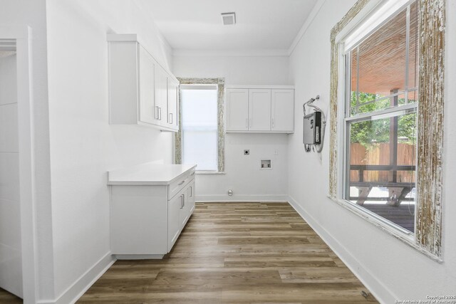 1526 Saint Marys, San Antonio, TX 78210 - washroom featuring electric dryer hookup, cabinet space, hookup for a washing machine, baseboards, and crown molding