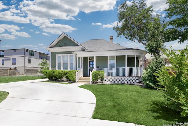 1526 Saint Marys, San Antonio, TX 78210 - view of front of property with covered porch, a front yard, and a chimney
