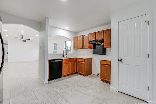 7111 Hallie, San Antonio, TX 78227 - kitchen featuring dishwasher, arched walkways, ceiling fan, a sink, and brown cabinetry