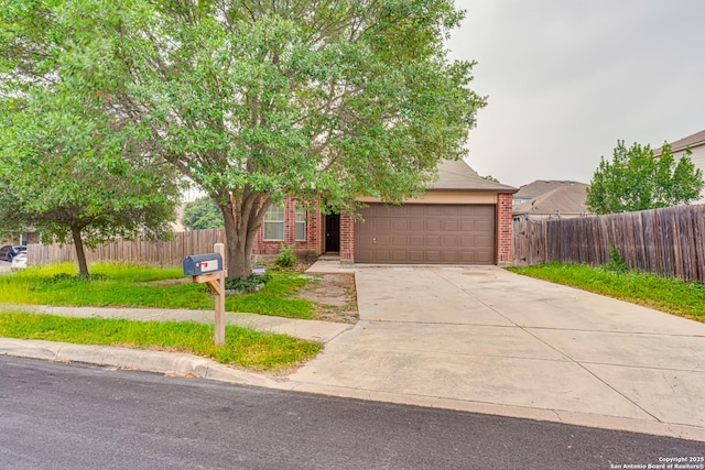 7111 Hallie, San Antonio, TX 78227 - obstructed view of property featuring brick siding, an attached garage, and concrete driveway