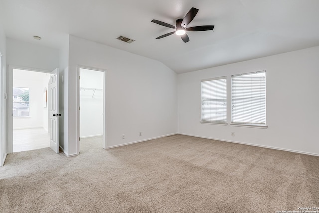 7111 Hallie, San Antonio, TX 78227 - carpeted spare room with ceiling fan, vaulted ceiling, and baseboards