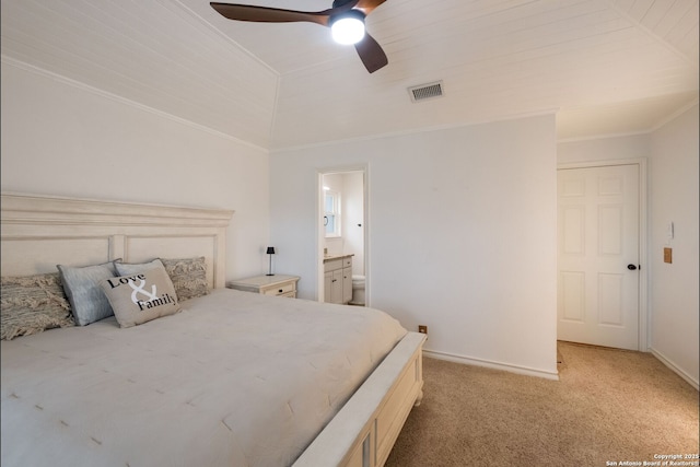 1308 Greenwood, Schertz, TX 78154 - bedroom featuring ornamental molding, light colored carpet, baseboards, ensuite bath, and a ceiling fan