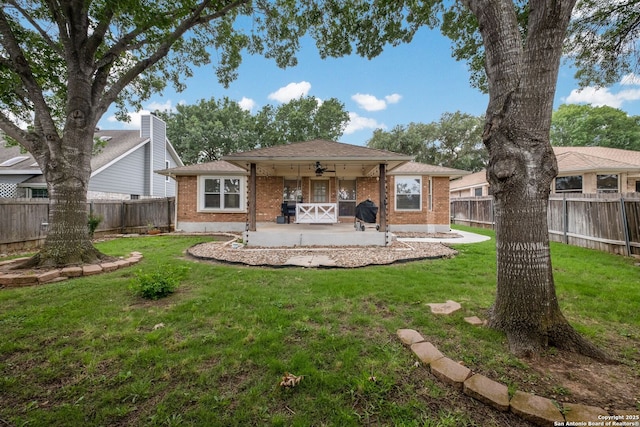 1308 Greenwood, Schertz, TX 78154 - rear view of property featuring ceiling fan, brick siding, a patio area, and a shingled roof