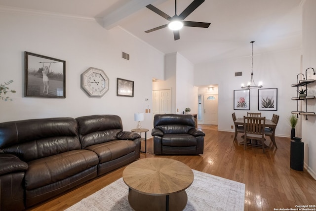 1308 Greenwood, Schertz, TX 78154 - living room featuring ceiling fan, a chandelier, wood finished floors, beam ceiling, and baseboards