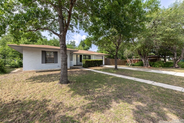 3702 La Sabre Dr, San Antonio, TX 78218 - ranch-style home with driveway, a garage, and brick siding