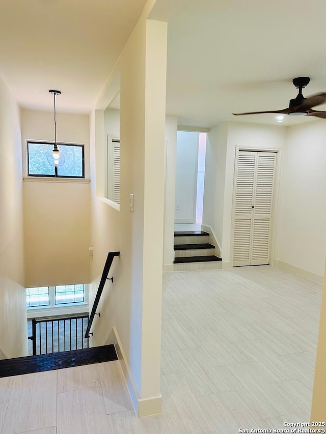 520 Sagecrest Dr, Hollywood Park, TX 78232 - stairs with baseboards, plenty of natural light, and ceiling fan